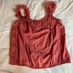 Coral Maurice’s brand tank top